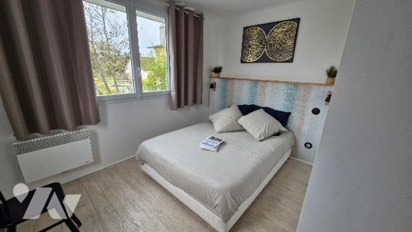 Immeuble d'habitation comprenant :