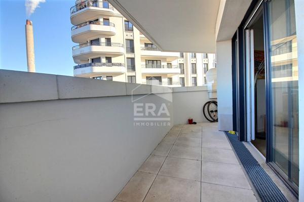 Grand 3P avec extérieur et parking dans les docks