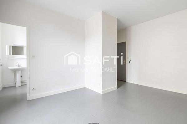 Appartement 1 pièce de 22 m2 au 1er étage sur 2 - cave en sous-sol