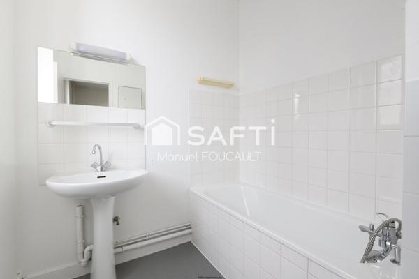 Appartement 1 pièce de 22 m2 au 1er étage sur 2 - cave en sous-sol