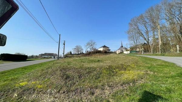 Inaumont : terrain de 1656m² au calme verdoyant.