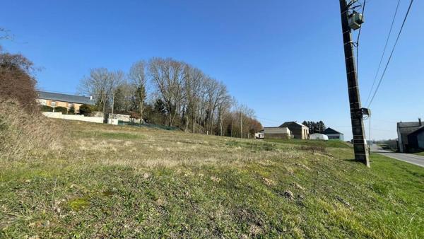 Inaumont : terrain de 1656m² au calme verdoyant.