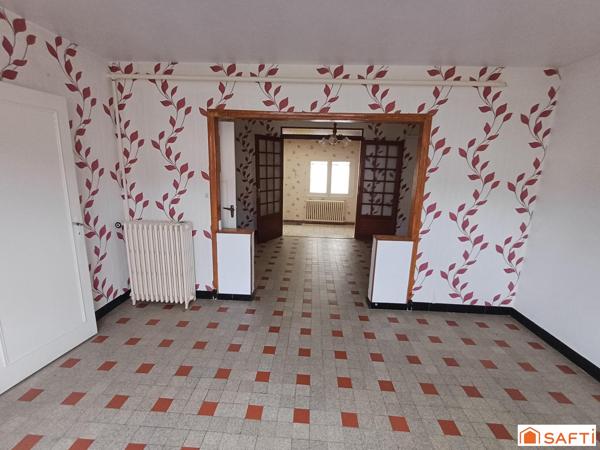 Maison familiale avec 3 chambres, jardinet, véranda et stationnement