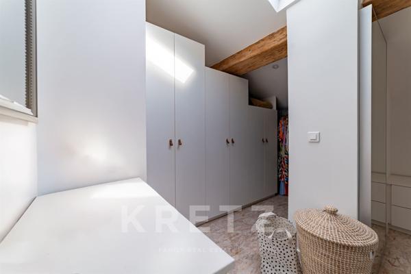 Duplex d'exception comme une maison en centre ville