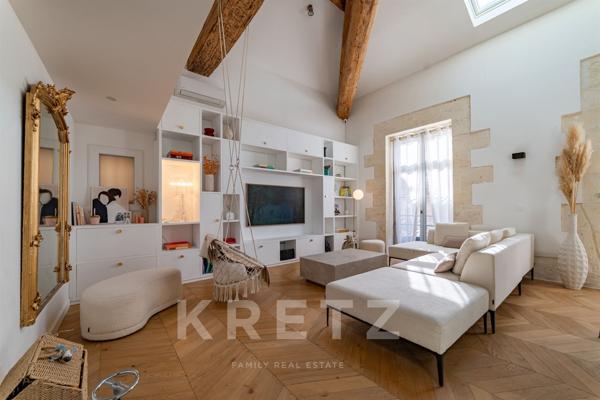 Duplex d'exception comme une maison en centre ville