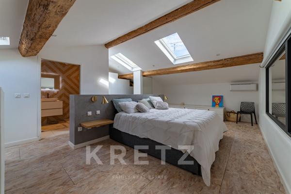 Duplex d'exception comme une maison en centre ville