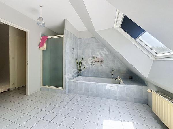Maison à vendre à ANCENIS quartier bois jauni avec trois chambres, garage et jardin.