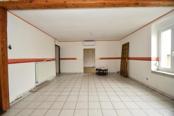 À Vendre – Immeuble avec potentiel locatif intéressant