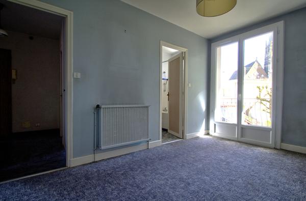 AGEN CENTRE VILLE - Appartement T2 traversant avec jardin, cellier et double balcons au sein d'un quartier recherché.