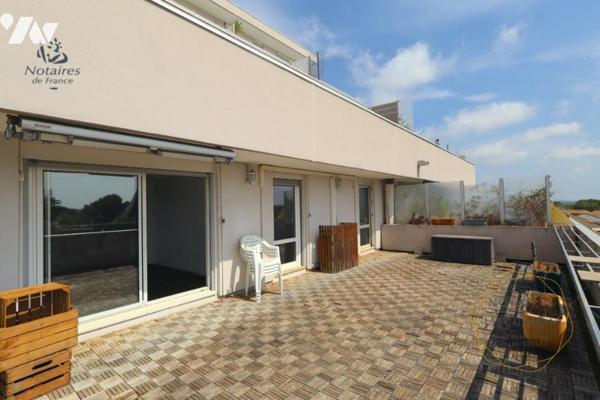 Appartement T3 avec grande terrasse, parking et cellier