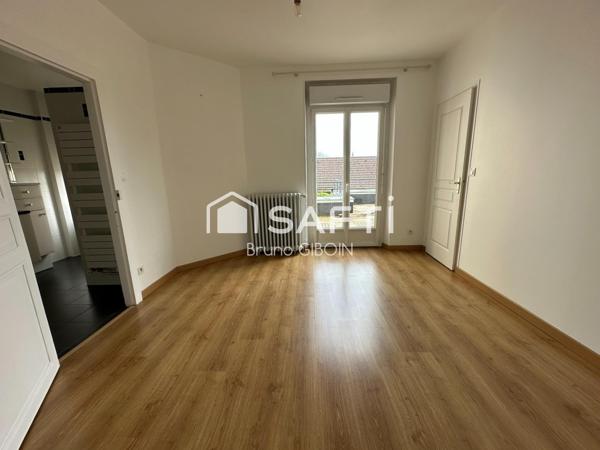 Maison Bourgeoise centre ville 208 m² avec jardin et stationnement.