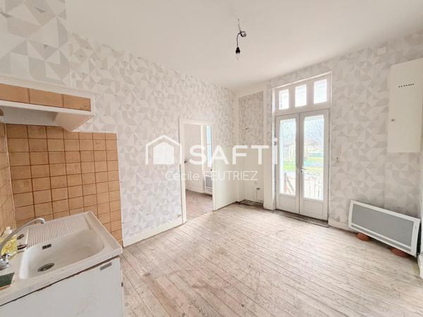 Jolie petite maison pleine de potentiel