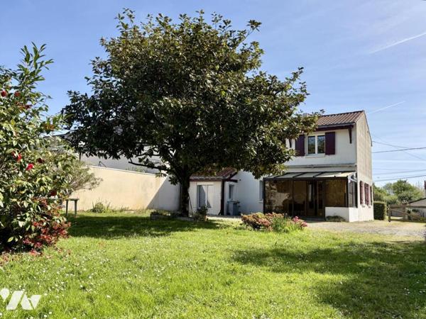 COUËRON - Maison avec beau jardin - 110m²
