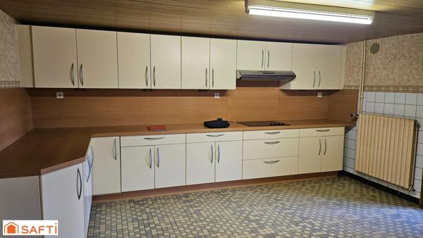 Maison avec véranda et beau terrain !