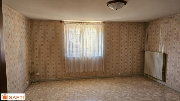 Maison avec véranda et beau terrain !