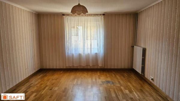 Maison avec véranda et beau terrain !