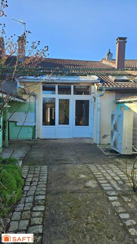 Maison avec véranda et beau terrain !