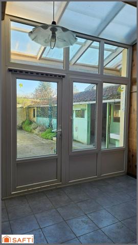 Maison avec véranda et beau terrain !