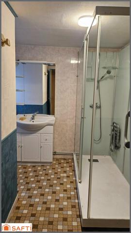 Maison avec véranda et beau terrain !