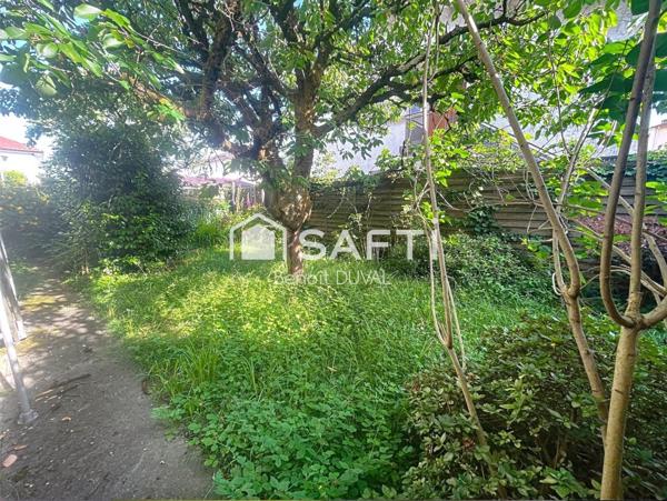 T3 avec jardin privatif, balcon, garage et parking