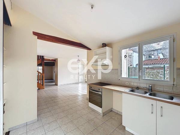 Maison- Apt au centre ville d'env. 120 m2 env. et garage