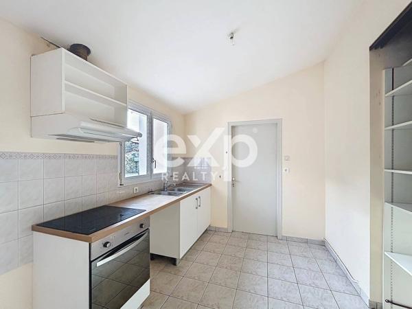 Maison- Apt au centre ville d'env. 120 m2 env. et garage