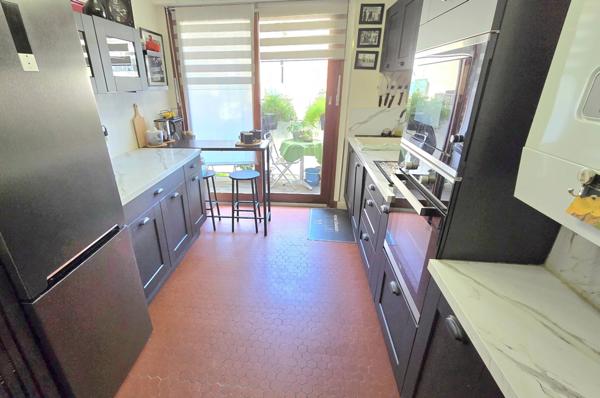 Béziers Champ de Mars : Appartement de charme rénové 77 m² avec terrasse et garage