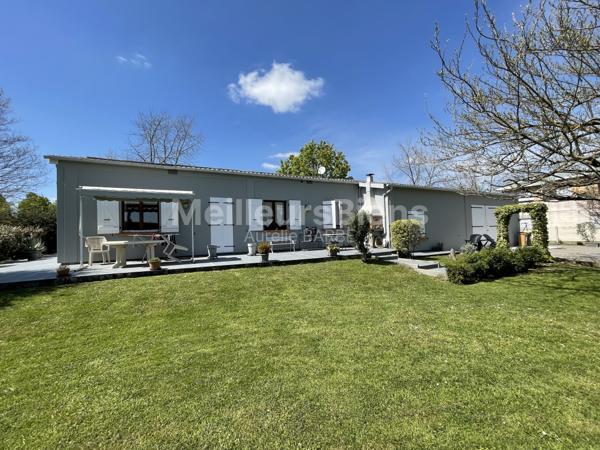 Maison d'habitation avec garage et atelier