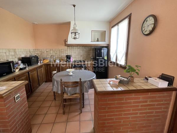 Maison d'habitation avec garage et atelier