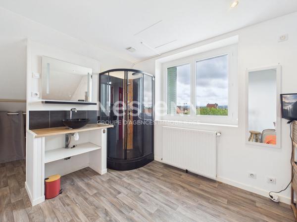 A Vendre à Aurillac, quartier Marmiers, Maison mitoyenne de type 7 avec garage et jardin paysagé.