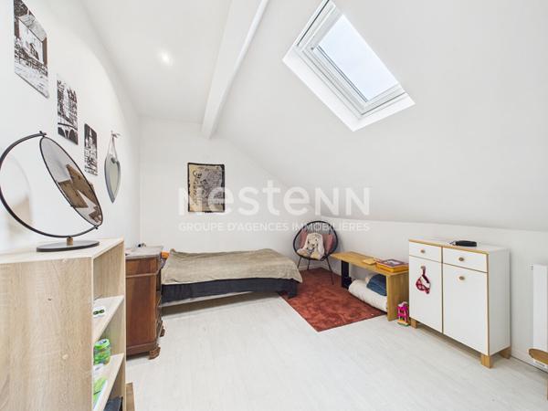 A Vendre à Aurillac, quartier Marmiers, Maison mitoyenne de type 7 avec garage et jardin paysagé.