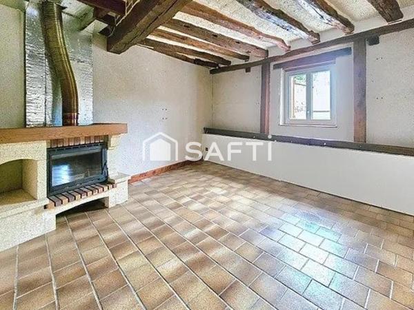 Une maison chaleureuse avec jardin clos et grange