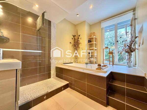 Appartement au RDC avec terrasse et jardin de 250m2