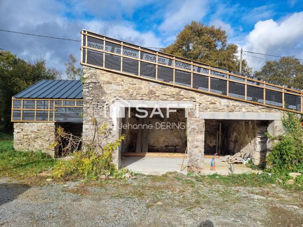 Bâtisse de caractère avec possibilité d'agrandissement