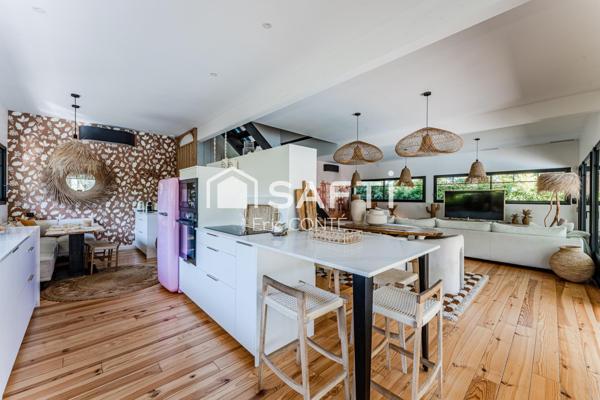 Maison d’exception avec piscine et prestations haut de gamme.