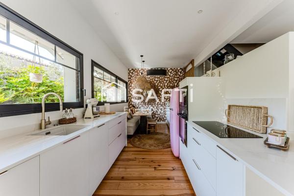 Maison d’exception avec piscine et prestations haut de gamme.