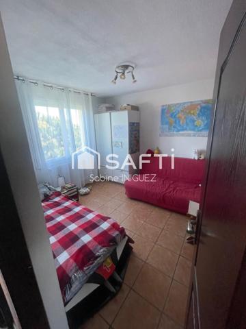 MAISON DE VILLE AVEC GARAGE ET JARDIN