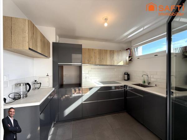 Superbe appartement de 3 pièces disposant d'une terrasse et d'une place de stationnement privée !