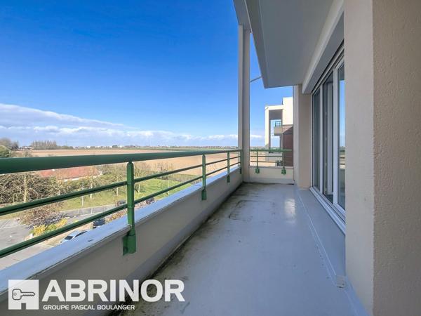 Appartement en duplex- Type 3 avec grande terrasse, balcon, cave et garage. WATTIGNIES