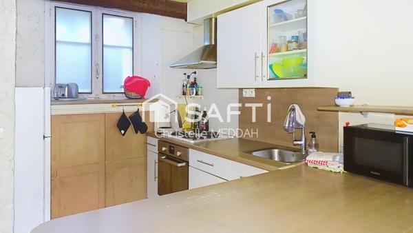 Maison en pierre mitoyenne