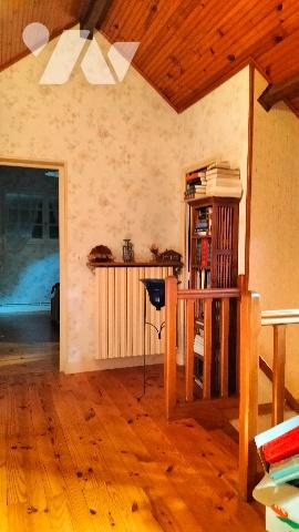 L'étude vous propose cette maison de 4 chambres avec pièce palière située dans un écrin de verdure