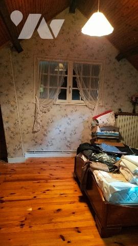 L'étude vous propose cette maison de 4 chambres avec pièce palière située dans un écrin de verdure