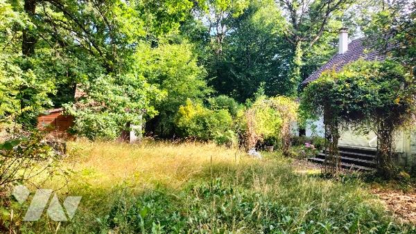 L'étude vous propose cette maison de 4 chambres avec pièce palière située dans un écrin de verdure