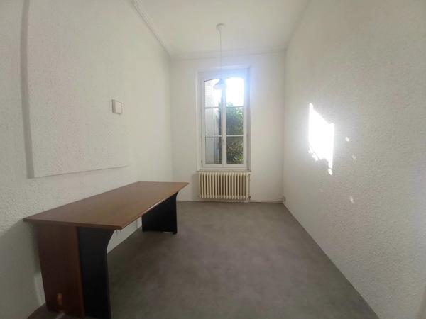 Élégant immeuble de style haussmannien avec jardin privé et fort potentiel d'investissement