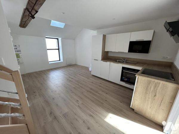 Appartement centre ville - Batiment refait à neuf