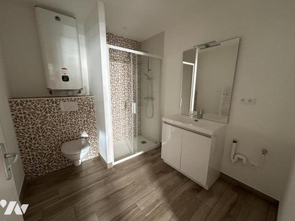 Appartement centre ville - Batiment refait à neuf