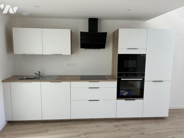 Appartement centre ville - Batiment refait à neuf