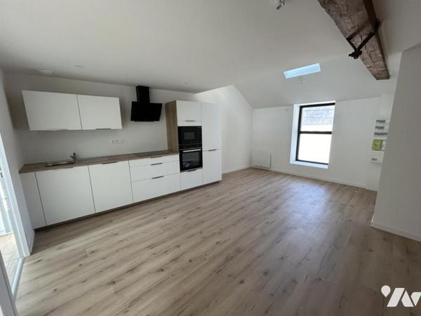 Appartement centre ville - Batiment refait à neuf