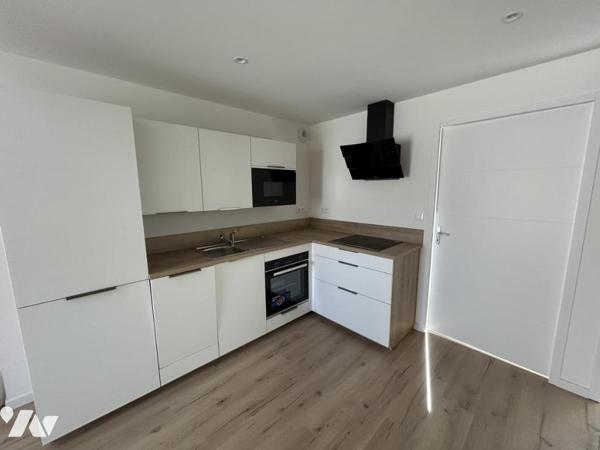 Appartement centre ville - Batiment refait à neuf