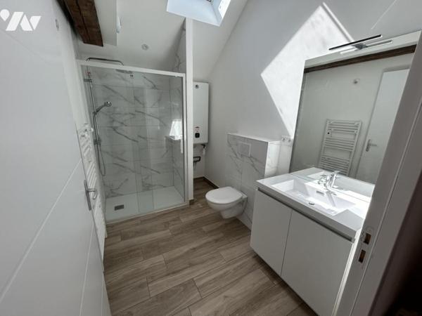 Appartement centre ville - Batiment refait à neuf